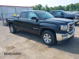 2018 GMC Sierra 1500 SLE z VIN 2GTV2MEC5J1109635, wystawiony jako IAAI lot #42410716 z przebiegiem 109 444 mil mil oraz . Historia ofert i sprzedaży dostępna na DreamBid. Obrazek 1.