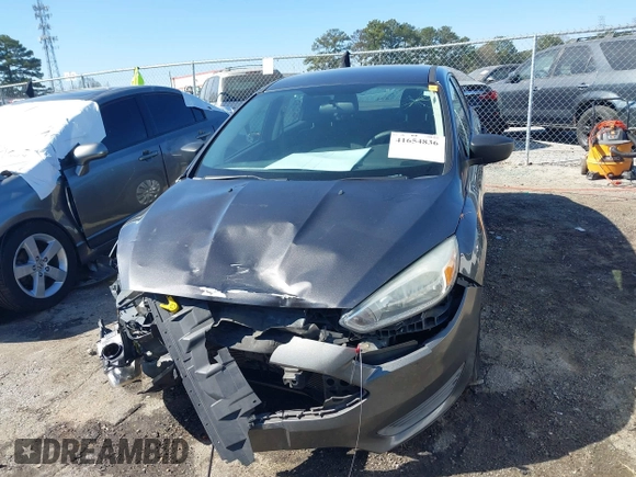 2017 Ford Focus S z VIN 1FADP3E29HL269607, wystawiony jako IAAI lot #41654836 z przebiegiem 101 645 mil mil oraz . Historia ofert i sprzedaży dostępna na DreamBid. Obrazek 12.