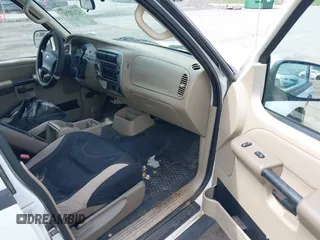 2005 Ford Explorer Sport Trac XLS z VIN 1FMZU77K85UB51935, wystawiony jako IAAI lot #42132767 z przebiegiem 170 057 mil mil oraz . Historia ofert i sprzedaży dostępna na DreamBid. Obrazek 5.