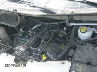2022 Ford Transit Cargo z VIN 1FTBR3XGXNKA36454, wystawiony jako IAAI lot #42157740 z przebiegiem 39 805 mil mil oraz . Historia ofert i sprzedaży dostępna na DreamBid. Obrazek 13.