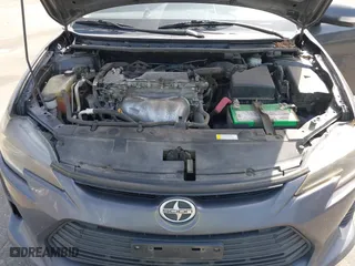 2015 Scion tC with VIN JTKJF5C71FJ013747, listed as a IAAI auction lot 42087740 with 138,097 mi miles. Bid and sale history available at carsss.com. Image 10.