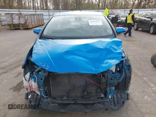 2021 Toyota Prius L Eco with VIN JTDKAMFU5M3145949, listed as a IAAI auction lot 42113123 with 127,872 mi miles and . Bid and sale history available at DreamBid. Image 12.