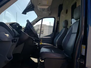 2015 Ford Transit with VIN 1FTNR2CG4FKA94008, listed as a Copart auction lot 60238194 with 238,468 mi miles and Salvage Title. Bid and sale history available at DreamBid. Image 7.
