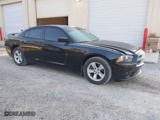 2012 Dodge Charger SE with VIN 2C3CDXBG7CH300367, listed as a IAAI auction lot 42067391 with 165,383 mi miles. Bid and sale history available at carsss.com. Image 1.