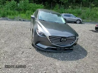 2019 Mazda CX-9 Touring z VIN JM3TCBCY5K0328655, wystawiony jako Copart lot #64627255 z przebiegiem 54 658 mil mil oraz Szkoda całkowita • Salvage title. Historia ofert i sprzedaży dostępna na DreamBid. Obrazek 14.