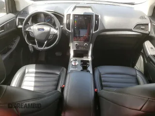 2022 Ford Edge SEL с VIN 2FMPK4J92NBB04407, выставлен на аукционе Copart как лот 62886745 с пробегом 38 676 миль миль и Чистый • Clean title. История ставок и продаж доступна на DreamBid. Изображение 8.