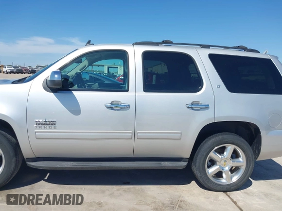 2013 Chevrolet Tahoe LT with VIN 1GNSCBE07DR164486, listed as a IAAI auction lot 42216421 with 220,395 mi miles and . Bid and sale history available at DreamBid. Image 14.