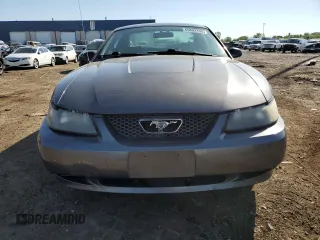 2004 Ford Mustang Standard z VIN 1FAFP40654F138305, wystawiony jako Copart lot #65882195 z przebiegiem 89 404 mil mil oraz Czysty tytuł • Clean title. Historia ofert i sprzedaży dostępna na DreamBid. Obrazek 5.