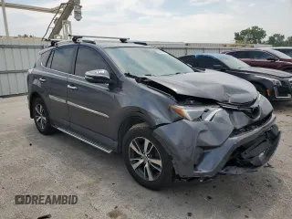 2016 Toyota RAV4 XLE with VIN 2T3RFREV0GW412875, listed as a Copart auction lot 59497545 with 226,604 mi miles and Salvage title. Bid and sale history available at DreamBid. Image 4.