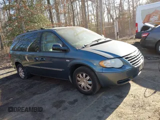 2006 Chrysler Town & Country LWB Touring with VIN 2A4GP54L16R701909, listed as a IAAI auction lot 41607902 with 170,630 mi miles. Bid and sale history available at carsss.com. Image 1.