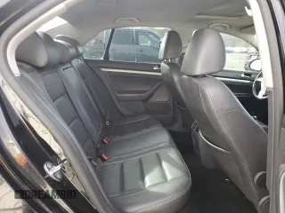 2009 Volkswagen Jetta Sedan SE with VIN 3VWRM71K09M141243, listed as a Copart auction lot 51507365 with 154,474 mi miles and Salvage Title. Bid and sale history available at carsss.com. Image 10.