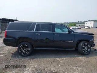 2015 Chevrolet Suburban LT with VIN 1GNSKJKC4FR222178, listed as a IAAI auction lot 42423080 with 234,870 mi miles and . Bid and sale history available at DreamBid. Image 13.