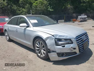 2011 Audi A8 with VIN WAURVAFD4BN019033, listed as a IAAI auction lot 42532173 with 97,486 mi miles and . Bid and sale history available at DreamBid. Image 1.