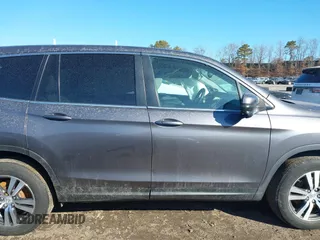 2017 Honda Pilot EX-L with VIN 5FNYF6H59HB101815, listed as a IAAI auction lot 41704661 with 130,479 mi miles and . Bid and sale history available at DreamBid. Image 13.