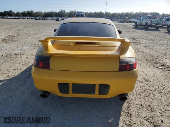 2000 Porsche 911 z VIN WP0AA2992YS622632, wystawiony jako Copart lot #75250794 z przebiegiem Nie podano mil oraz Szkoda całkowita • Salvage title. Historia ofert i sprzedaży dostępna na DreamBid. Obrazek 6.