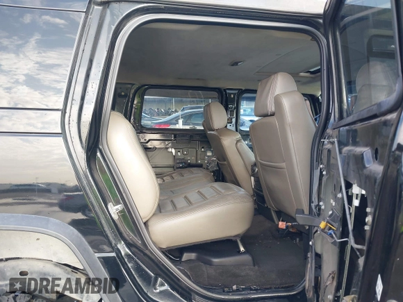 2003 Hummer H2 z VIN 5GRGN23UX3H112173, wystawiony jako IAAI lot #41093359 z przebiegiem Nie podano mil oraz . Historia ofert i sprzedaży dostępna na DreamBid. Obrazek 8.