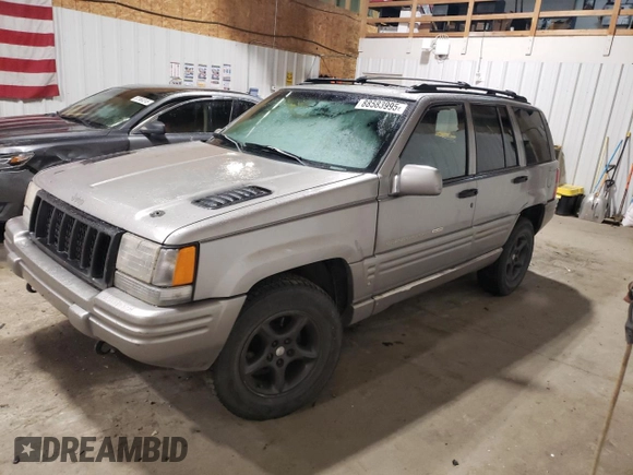 1998 Jeep Grand Cherokee Limited with VIN 1J4GZ88Z1WC289820, listed as a Copart auction lot 88583995 with 245,572 mi miles and Clean Title. Bid and sale history available at carsss.com. Image 1.
