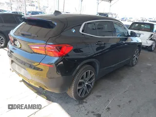 2018 BMW X2 sDrive28i with VIN WBXYJ3C32JEJ84291, listed as a IAAI auction lot 42575234 with 65,081 mi miles and . Bid and sale history available at DreamBid. Image 4.