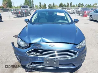 2019 Ford Fusion SE with VIN 3FA6P0HD6KR177660, listed as a IAAI auction lot 42164831 with 66,585 mi miles and . Bid and sale history available at DreamBid. Image 13.