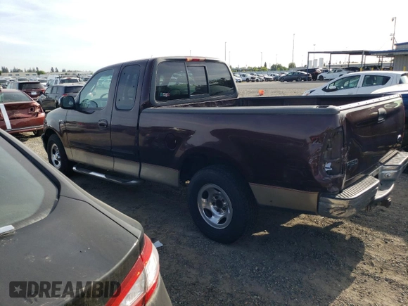 2000 Ford F-150 with VIN 1FTRX17W5YKA50203, listed as a Copart auction lot 54734615 with Not Provided miles and Salvage Title. Bid and sale history available at DreamBid. Image 2.