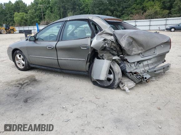 2002 Ford Taurus SES Standard with VIN 1FAFP55U42A184084, listed as a Copart auction lot 59822495 with 124,835 mi miles and Salvage title. Bid and sale history available at DreamBid. Image 2.