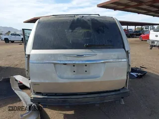 2014 Chrysler Town & Country Touring with VIN 2C4RC1BG9ER272798, listed as a IAAI auction lot 41555830 with 120,611 mi miles and . Bid and sale history available at DreamBid. Image 6.