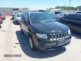 2012 Jeep Compass Sport with VIN 1C4NJCBA9CD684182, listed as a IAAI auction lot 41973857 with 216,722 mi miles. Bid and sale history available at carsss.com. Image 1.