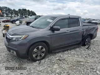 2019 Honda Ridgeline RTL-E with VIN 5FPYK3F77KB005131, listed as a Copart auction lot 60726155 with 81,797 mi miles and Salvage title. Bid and sale history available at DreamBid. Image 1.
