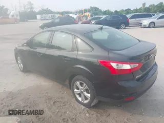 2013 Ford Focus SE with VIN 1FADP3F27DL306677, listed as a IAAI auction lot 42495368 with 96,451 mi miles and . Bid and sale history available at DreamBid. Image 3.