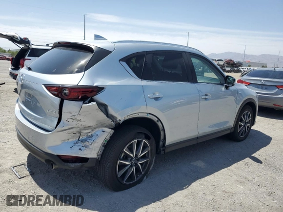 2018 Mazda CX-5 Grand Touring with VIN JM3KFBDM0J0377243, listed as a Copart auction lot 62199295 with 37,930 mi miles and Salvage title. Bid and sale history available at DreamBid. Image 3.
