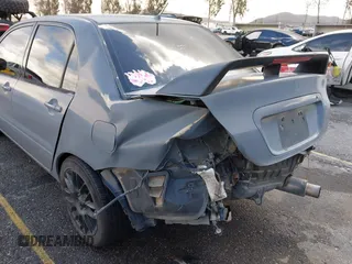 2004 Mitsubishi Lancer ES with VIN JA3AJ26E54U054570, listed as a IAAI auction lot 41592397 with 220,140 mi miles. Bid and sale history available at carsss.com. Image 6.