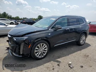 2023 Cadillac XT6 AWD Premium Luxury with VIN 1GYKPFRS7PZ225950, listed as a Copart auction lot 65573174 with Not Provided miles and Salvage Title. Bid and sale history available at DreamBid. Image 1.