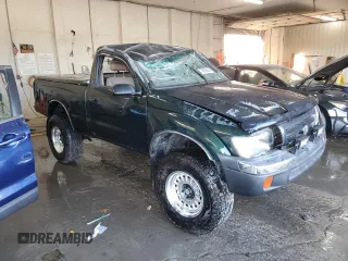 1999 Toyota Tacoma with VIN 4TAPM62N9XZ555738, listed as a Copart auction lot 78293634 with 210,096 mi miles and Salvage Title. Bid and sale history available at DreamBid. Image 4.