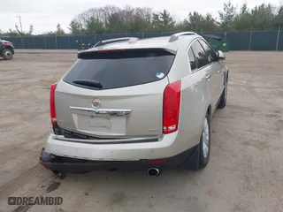 2016 Cadillac SRX Luxury Collection with VIN 3GYFNBE30GS523607, listed as a IAAI auction lot 41826457 with 94,117 mi miles. Bid and sale history available at carsss.com. Image 4.