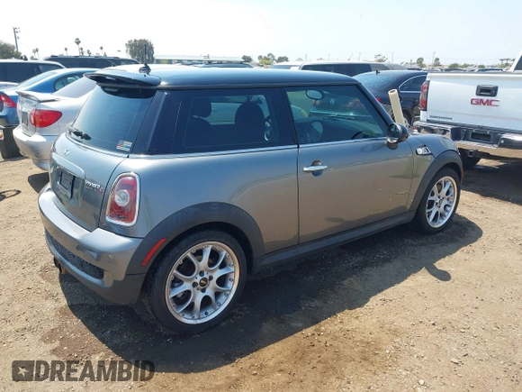 2010 MINI Hardtop S with VIN WMWMF7C53ATZ70244, listed as a IAAI auction lot 42673174 with 137,805 mi miles and . Bid and sale history available at DreamBid. Image 4.