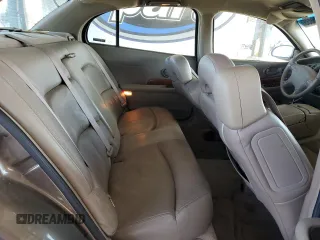 2000 Buick LeSabre Limited z VIN 1G4HR54KXYU139070, wystawiony jako Copart lot #61306035 z przebiegiem 183 354 mil mil oraz Czysty tytuł • Clean title. Historia ofert i sprzedaży dostępna na DreamBid. Obrazek 10.