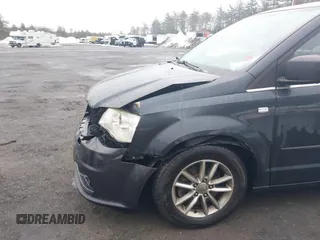 2014 Dodge Grand Caravan SXT with VIN 2C4RDGCG2ER463395, listed as a IAAI auction lot 41709948 with 137,783 mi miles and . Bid and sale history available at DreamBid. Image 12.