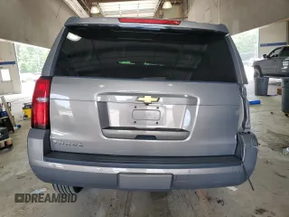 2018 Chevrolet Tahoe LT с VIN 1GNSKBKC1JR368178, выставлен на аукционе Copart как лот 60198975 с пробегом 127 651 миль миль и Списание • Salvage title. История ставок и продаж доступна на DreamBid. Изображение 6.