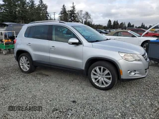 2011 Volkswagen Tiguan SE with VIN WVGBV7AX1BW559924, listed as a Copart auction lot 53914175 with 215,511 mi miles and Clean Title. Bid and sale history available at DreamBid. Image 4.