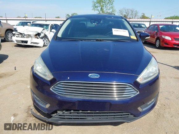 2017 Ford Focus Titanium with VIN 1FADP3J29HL204892, listed as a IAAI auction lot 42032705 with 119,028 mi miles and . Bid and sale history available at DreamBid. Image 13.