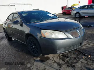 2006 Pontiac G6 6-Cyl with VIN 1G2ZG558264119494, listed as a IAAI auction lot 40977267 with 180,404 mi miles. Bid and sale history available at carsss.com. Image 1.