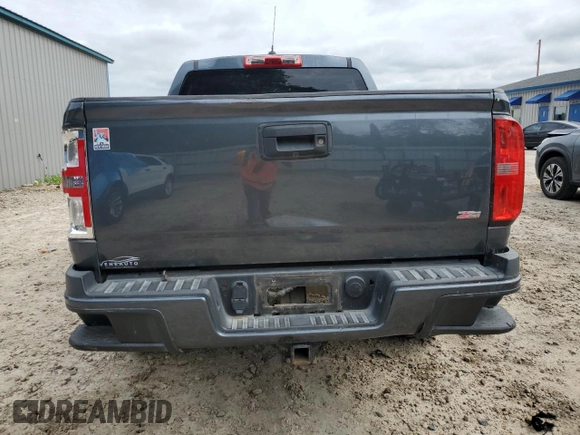 2015 Chevrolet Colorado 2WD Z71 with VIN 1GCGSCE30F1146978, listed as a Copart auction lot 56800985 with 201,186 mi miles and Salvage title. Bid and sale history available at DreamBid. Image 6.