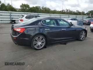 2015 Maserati Ghibli z VIN ZAM57XSA5F1129866, wystawiony jako Copart lot #51738015 z przebiegiem Nie podano mil oraz Szkoda całkowita • Salvage title. Historia ofert i sprzedaży dostępna na DreamBid. Obrazek 3.