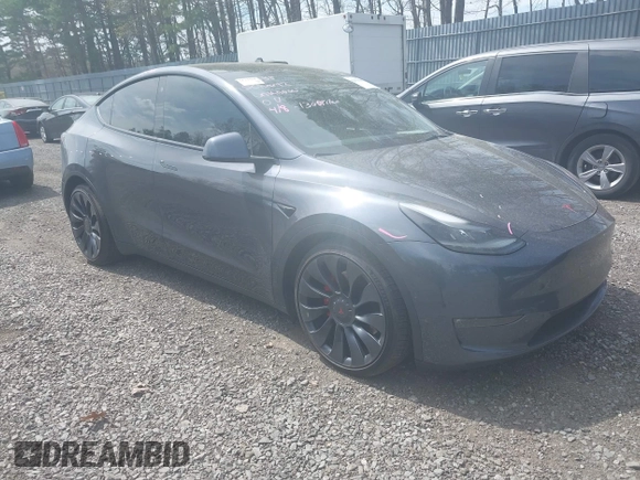 2022 Tesla Model Y Performance with VIN 7SAYGDEF3NF324705, listed as a IAAI auction lot 42076565 with 66,573 mi miles and . Bid and sale history available at DreamBid. Image 1.