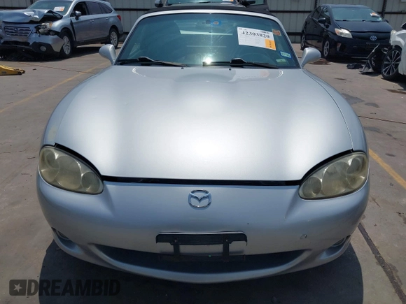 2002 Mazda MX-5 Miata Cloth z VIN JM1NB353020225252, wystawiony jako IAAI lot #42303820 z przebiegiem 194 549 mil mil oraz . Historia ofert i sprzedaży dostępna na DreamBid. Obrazek 12.