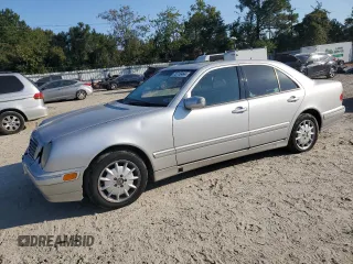 2000 Mercedes-Benz E-Class with VIN WDBJF65J3YB167247, listed as a Copart auction lot 75715464 with 0 mi miles and Salvage Title. Bid and sale history available at carsss.com. Image 1.