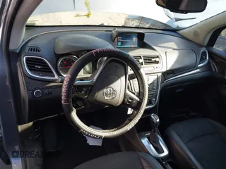 2015 Buick Encore with VIN KL4CJASB3FB168155, listed as a IAAI auction lot 41861563 with 57,574 mi miles. Bid and sale history available at carsss.com. Image 17.