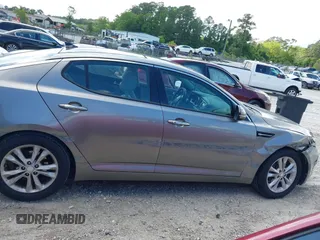 2013 Kia Optima EX z VIN 5XXGN4A73DG246046, wystawiony jako IAAI lot #42196691 z przebiegiem 82 840 mil mil oraz . Historia ofert i sprzedaży dostępna na DreamBid. Obrazek 13.