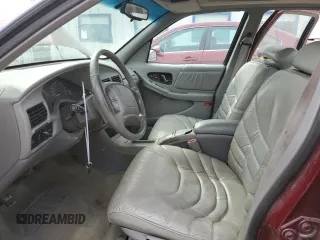 1996 Buick Regal with VIN 2G4WF52K9T1417982, listed as a Copart auction lot 49963815 with 98,269 mi miles and Salvage Title. Bid and sale history available at DreamBid. Image 7.