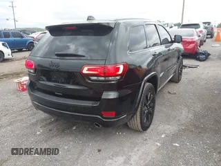 2020 Jeep Grand Cherokee Laredo E with VIN 1C4RJEAG7LC324904, listed as a IAAI auction lot 42600961 with 93,444 mi miles and . Bid and sale history available at DreamBid. Image 4.